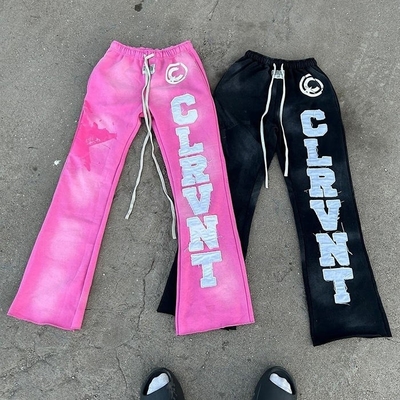 kaufen Flared Männer-Sweatpants schwarz Oversized Cut Raw Hem Säure Waschen Sonnenverblendet Stickplatte online manufacture