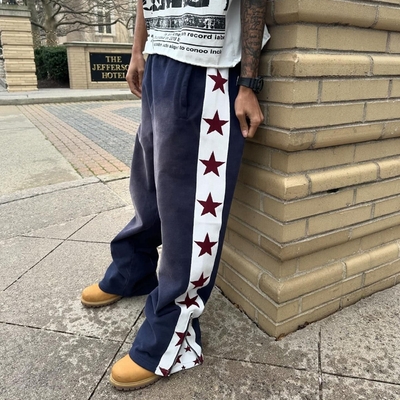 kaufen Custom Streetwear für Männer Anti-statische Sweatpants im Baggy Flared Style mit Seitenstreifen online manufacture