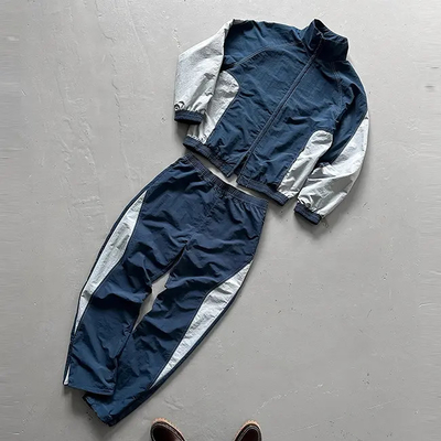 kaufen Custom Windbreaker Tracksuit Baggy Männer Jogging Anzug Übergroße Polyester Nylon Tracksuit Windbreaker Tracksuit Set Männer online manufacture